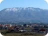 Maja e Priskës, seen from Sauk. The highest point appears to be in the middle of the ridge. Qafë Priske is on the left. It is used to access the trailhead behind the mountain